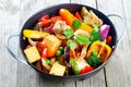 Healthy snack of roast vegetables and tofu