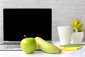 Healthy snack with working in office. Green apple and banana with fresh water for diet Health Planning, Royalty Free Stock Photo