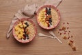 Healthy snacks in bowl: yoghurt, oat flakes, fruit, chia and goji seeds Royalty Free Stock Photo