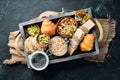 Healthy snacks in a wooden box. oatmeal bars, croissant, raisins, nuts. Top view. Free space Royalty Free Stock Photo