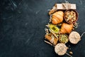 Healthy snacks in a wooden box. oatmeal bars, croissant, raisins, nuts. Top view. Free space Royalty Free Stock Photo