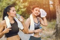 Healthy sport women thirsty drinking water during exercise in hot summer season Royalty Free Stock Photo