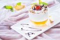 Healthy strawberry, peach and walnut parfait in a glass on a white background Royalty Free Stock Photo