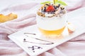 Healthy strawberry, peach and walnut parfait in a glass on a white background Royalty Free Stock Photo