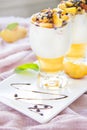 Healthy strawberry, peach and walnut parfait in a glass on a white background Royalty Free Stock Photo