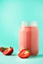 Healthy strawberry smoothie in glass on gray background with copy space. Banner. Summer food and clean eating concept Royalty Free Stock Photo