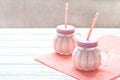 Healthy strawberry smoothie in a mason a jar mug