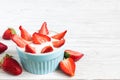 Healthy strawberry yogurt with fresh berries over white wooden table. healthy breakfast