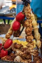 Healthy street food to go - sausages, poultry, meat, bell peppers and red tomatoes. Royalty Free Stock Photo