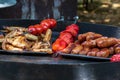 Healthy street food to go - sausages, poultry, meat, bell peppers and red tomatoes. Royalty Free Stock Photo