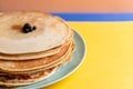 Healthy summer breakfast, homemade classic american pancakes with fresh blueornin berries. bright colorful background Royalty Free Stock Photo