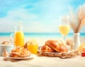 Healthy summer breakfast on sand beach near sea water over blue sky. Summer holiday or vacation background. Created with