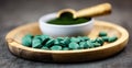 Healthy supplements - chlorella, spirulina algae powder and pills Royalty Free Stock Photo