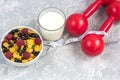 Healthy tasty breakfast: bowl with corn flakes and berries and glass of milk Royalty Free Stock Photo