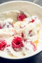 Healthy and tasty breakfast with curd, sour cream, raspberry and honey