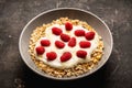 Healthy and tasty breakfast with muesli, yogurt, raspberry and honey