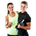 Healthy teen couple with weights.