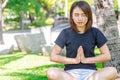 Healthy teen wear casual cloth doing yoga outdoor for relax and concentration Royalty Free Stock Photo