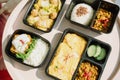 Healthy thai food concept. Four lunch box set on table