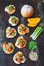 Healthy toasts with pumpkin and green onions. Pumpkin bruschetta.