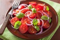 healthy tomato salad with onion basil olive oil and balsamic vinegar