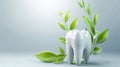 A healthy tooth and leaves on a blue background, a dental model of a premolar. Advertising of dental clinic, toothpaste