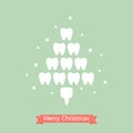 Healthy tooth in the shape of Christmas tree for Merry Christmas and Happy New Year