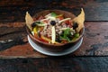 Healthy tuna salad on rustic wooden kitchen table