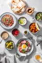 Healthy Turkish breakfast spread in the bright morning, white background Royalty Free Stock Photo