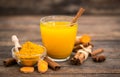 Healthy turmeric drink with honey, cinnamon, lemon and ginger