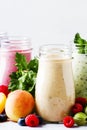 Healthy and useful colorful berry cokctalis, smoothies and milks