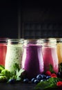 Healthy and useful colorful berry cokctalis, smoothies and milks