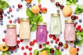 Healthy and useful colorful berry cokctalis, smoothies and milks