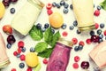 Healthy and useful colorful berry cokctalis, smoothies and milks