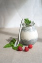 Healthy vanilla hemp pudding in a glass with fresh berries