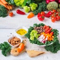 Healthy vegan buddha bowl with kale leaves and raw vegetables Royalty Free Stock Photo