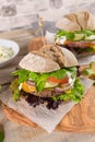 Healthy vegan burger with fresh vegetables and yogurt sauce Royalty Free Stock Photo
