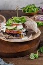 Healthy vegan burger with fresh vegetables and yogurt sauce Royalty Free Stock Photo