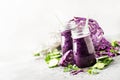 Healthy vegan detox purple smoothies or juice from red cabbage,