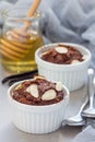 Healthy vegan homemade dessert with avocado, cocoa, vanilla, honey and almond milk, chocolate mousse