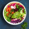 Healthy vegan lunch bowl salad. Avocado, red bean, tomato, cucu
