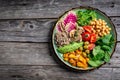 Healthy vegan lunch buddha bowl. Avocado, quinoa, tomato, cucumber, vegetables salad. Delicious breakfast or snack, Clean eating, Royalty Free Stock Photo