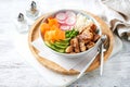 Healthy Vegan Poke bowl salad, heura vegetable protein, vegan chicken with variety vegetables, rice, served in bowl Royalty Free Stock Photo