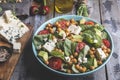 Healthy vegan salad with avocado ,beet leaves ,chickpea, broccoli ,tomato,blue cheese Royalty Free Stock Photo