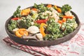 Healthy vegan salad with roasted vegetables, tahini, quinoa and