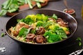 Healthy vegan salad of vegetables - broccoli, mushrooms, spinach and quinoa in a bowl Royalty Free Stock Photo
