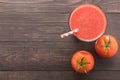 Healthy vegetable. Glass of red tomato juice on wooden table Royalty Free Stock Photo