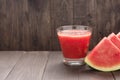 Healthy vegetable. Glass of red tomato juice on wooden table Royalty Free Stock Photo