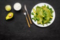 Healthy vegetable pancake. Spinach pancakes on black background top view copy space