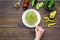 Healthy vegetable pancake. Spinach pancakes served with cucumber, avocado and greenery on dark wooden background top Royalty Free Stock Photo